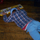 chris ballew playing his keyboard whilst lying on the floor