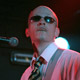 chris ballew wearing sunglasses on stage in paris france